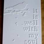 White words on white canvas - finished product. Inexpensive DIY artwork.