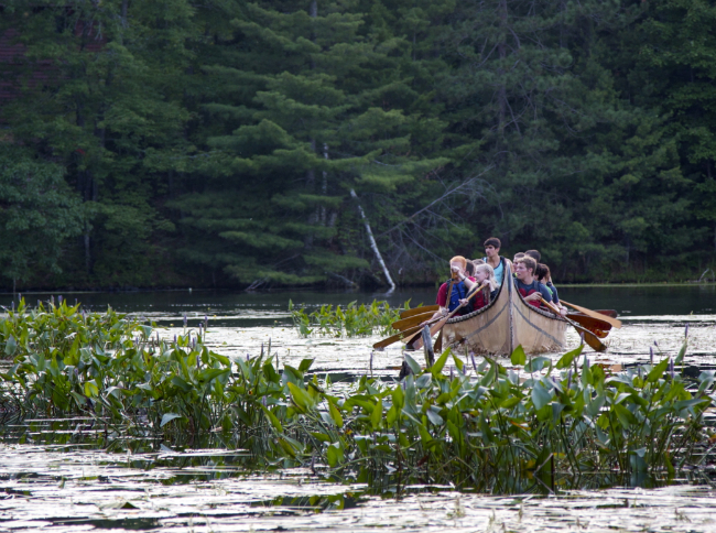 Canoers at dusk. Canoers at dusk.