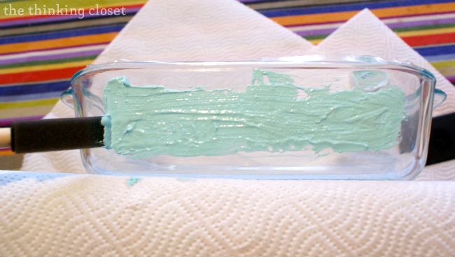 Spreading out the etching cream in a thick, even layer.