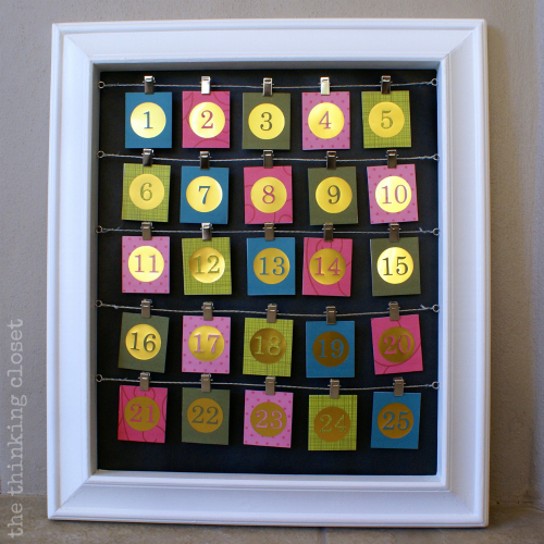 DIY Advent Calendar...Gold numbers on one side - - flip them over to reveal Instagram photos from the past year!