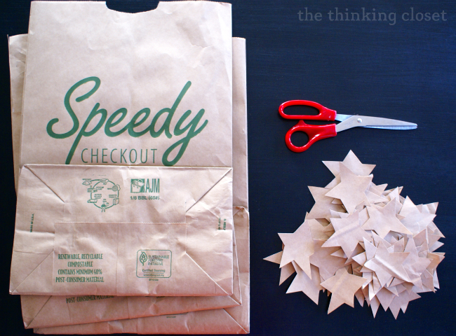 PaperStars Cutting out paper stars for a Gratitude Garland via thinkingcloset.com