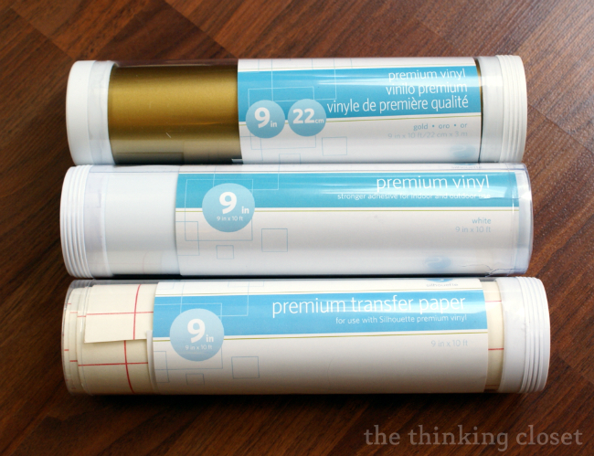 Readying my supplies: gold and white vinyl and transfer paper. Readying my supplies: gold and white vinyl and transfer paper.