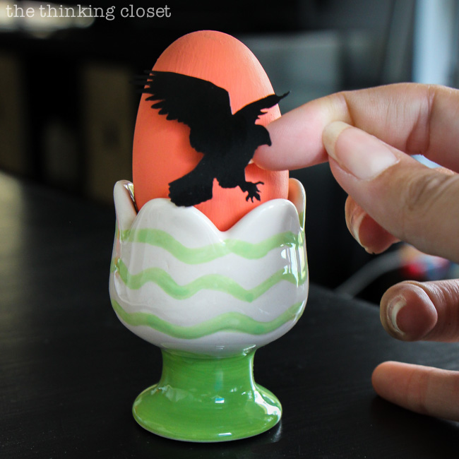 Placing the vinyl bird silhouettes onto the Easter eggs! Placing the vinyl bird silhouettes onto the Easter eggs!