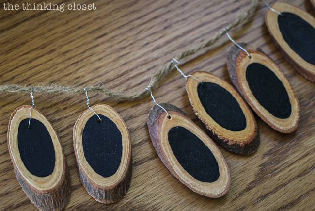 Chalkboard painted wood slices, prepped for a "Welcome" banner. Chalkboard painted wood slices, prepped for a "Welcome" banner.