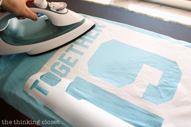 Ironing down your freezer paper stencil via thinkingcloset.com Ironing down your freezer paper stencil via thinkingcloset.com