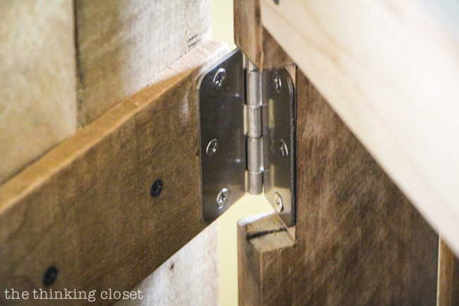 Notches on the side door of the Rustic Pallet Recycle Bin. Tutorial via thinkingcloset.com Notches on the side door of the Rustic Pallet Recycle Bin. Tutorial via thinkingcloset.com