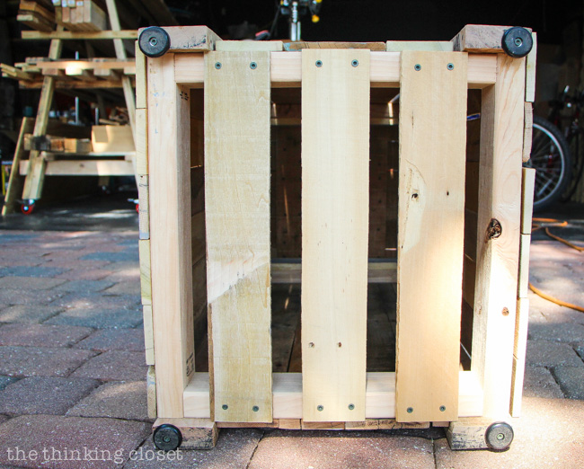 Finishing the bottom of the Rustic Pallet Recycle Bin. Step by step tutorial by thinkingcloset.com Finishing the bottom of the Rustic Pallet Recycle Bin. Step by step tutorial by thinkingcloset.com