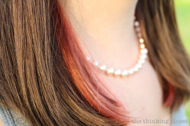 The red peek-a-boo highlights! Peeking out. via thinkingcloset.com The red peek-a-boo highlights! Peeking out. via thinkingcloset.com