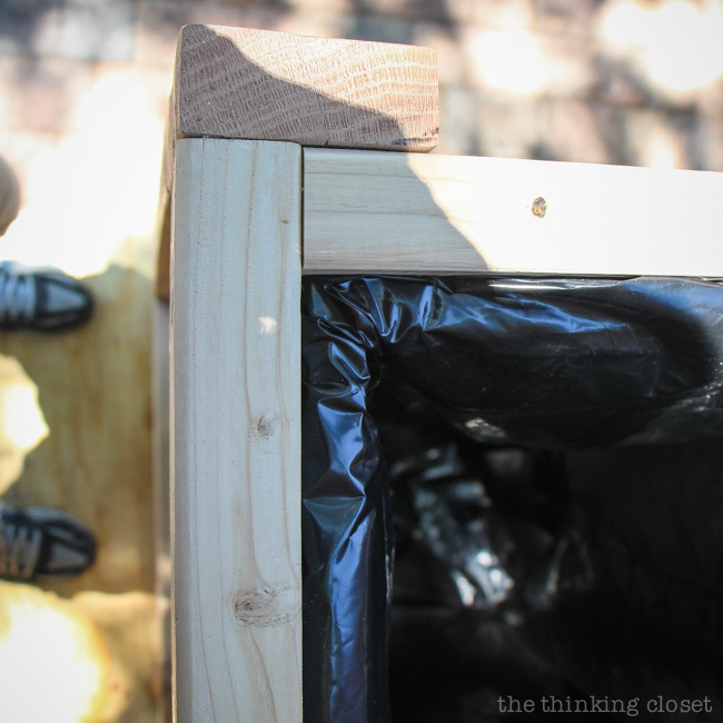 How the contractor bag is secured to the inside frame of the Pallet Recycle Bin via thinkingcloset.com How the contractor bag is secured to the inside frame of the Pallet Recycle Bin via thinkingcloset.com