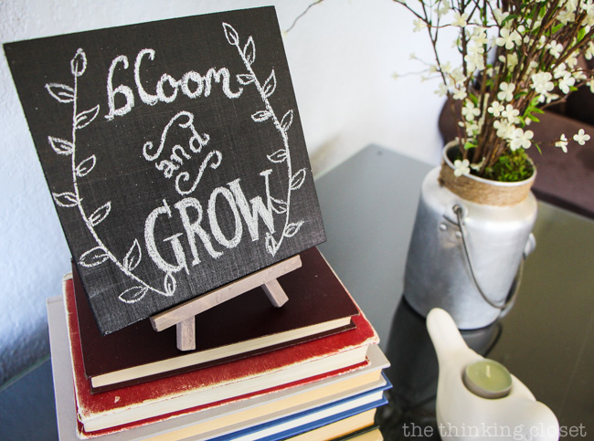 Rustic Vintage Spring Mantel: Vintage books are the perfect platform for displaying a DIY chalkboard! via thinkingcloset.com Rustic Vintage Spring Mantel: Vintage books are the perfect platform for displaying a DIY chalkboard! via thinkingcloset.com