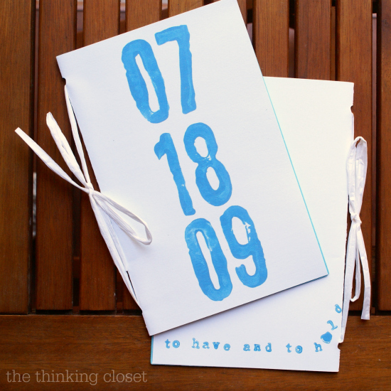 DIY Wedding Programs: stamped with the wedding date and tied with a raffia ribbon! 