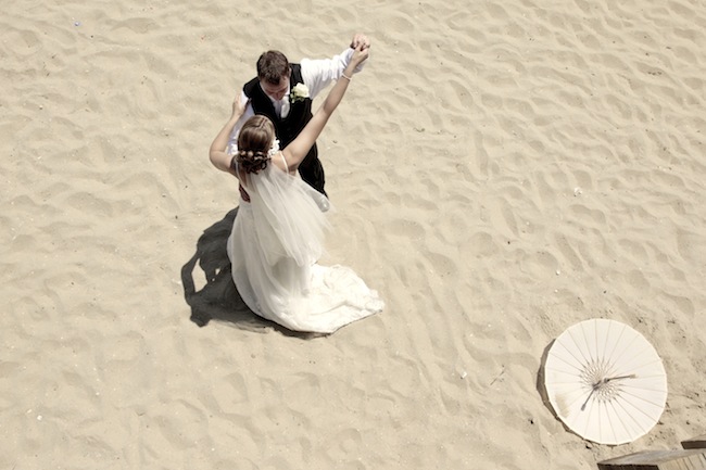 Dancing on the sand.... During the limbo between ceremony and reception. Dancing on the sand.... During the limbo between ceremony and reception.