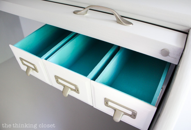 Roll Top Desk Makeover. The best part? The element of surprise on the inside of the drawers: gem turquoise!