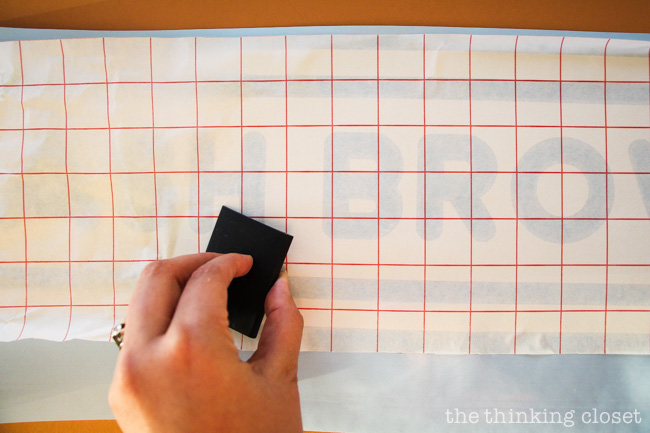 Applying transfer paper to the vinyl design for our Punny #Hashtag Halloween Costume for Couples. Full tutorial & FREE Silhouette cut file via thinkingcloset.com Applying transfer paper to the vinyl design for our Punny #Hashtag Halloween Costume for Couples. Full tutorial & FREE Silhouette cut file via thinkingcloset.com