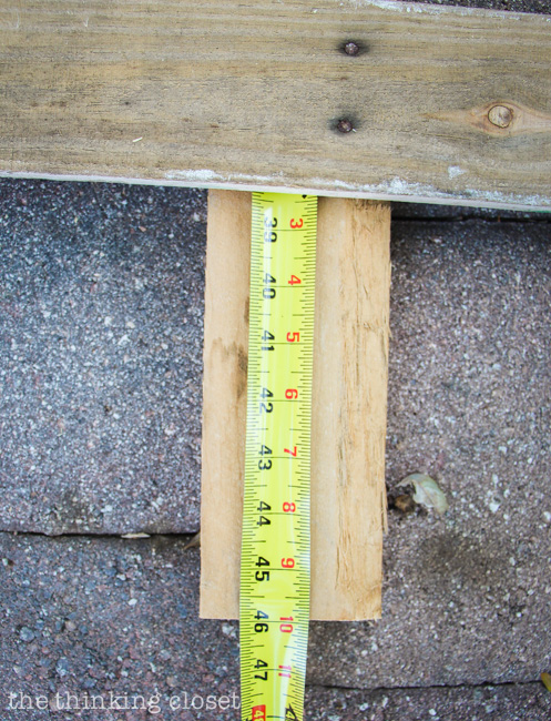 Measuring out the pallet wood for our Rustic Pallet Christmas Tree