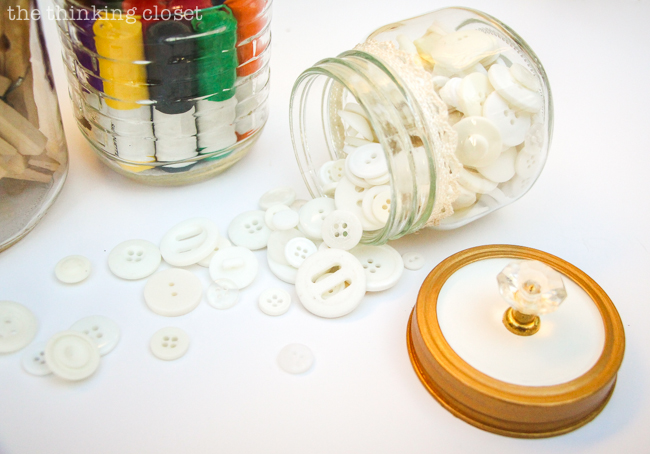 Fancy Dancy Mason Jar Upcycle for Swap It Like It's Hot! | Watch what happens when bloggers send each other thrifted finds and exercise their DIY powers! I got a trinket box with pretty knobs and transformed it into pretty craft supply storage. Tutorial includes links to all of the bloggers in Swap It Like It's Hot 3.0, so check out the wealth of inspiration. You'll never look at a thrifted find the same way again. Fancy Dancy Mason Jar Upcycle for Swap It Like It's Hot! | Watch what happens when bloggers send each other thrifted finds and exercise their DIY powers! I got a trinket box with pretty knobs and transformed it into pretty craft supply storage. Tutorial includes links to all of the bloggers in Swap It Like It's Hot 3.0, so check out the wealth of inspiration. You'll never look at a thrifted find the same way again.