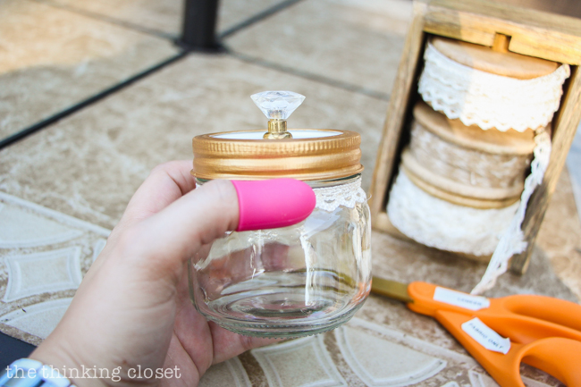 Swap It Like Its Hot: Fancy Dancy Mason Jar Upcycle - Putting the finishing touches on the jars with some lace!