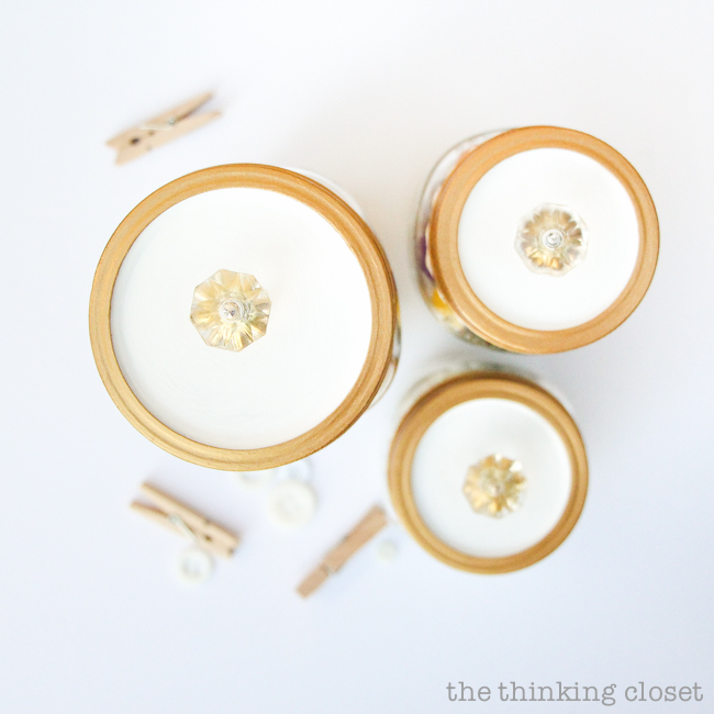 Fancy Dancy Mason Jar Upcycle for Swap It Like It's Hot! | Watch what happens when bloggers send each other thrifted finds and exercise their DIY powers! I got a trinket box with pretty knobs and transformed it into pretty craft supply storage. Tutorial includes links to all of the bloggers in Swap It Like It's Hot 3.0, so check out the wealth of inspiration. You'll never look at a thrifted find the same way again. Fancy Dancy Mason Jar Upcycle for Swap It Like It's Hot! | Watch what happens when bloggers send each other thrifted finds and exercise their DIY powers! I got a trinket box with pretty knobs and transformed it into pretty craft supply storage. Tutorial includes links to all of the bloggers in Swap It Like It's Hot 3.0, so check out the wealth of inspiration. You'll never look at a thrifted find the same way again.