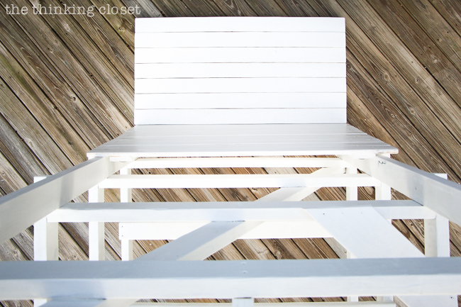 DIY Coastal Wood Plank Photo Backdrop |  Here's the full step by step run-down for how to make your own set of pallets for a professional-looking photo backdrop inspired by a beachy lifeguard stand!  Tutorial includes drawn-out plans, helpful photos, and of course, a curious kitty cat!