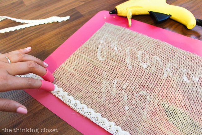 Love using my handy hot glue gun helper to adhere the lace to the burlap (without burning off my fingertips!). Love using my handy hot glue gun helper to adhere the lace to the burlap (without burning off my fingertips!).
