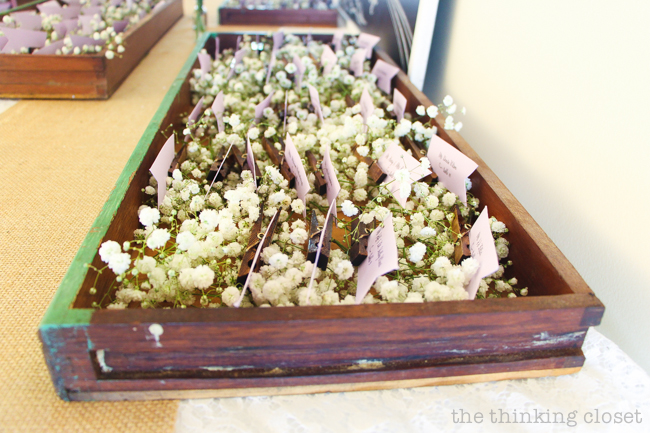 DIY Rustic Vintage Clothespin Place Card Holders | Love that can save on cost, but not scrimp on beauty with these gems! Step by step photo tutorial includes instructions on the easy method of staining the clothespins and how to design and cut the place card flags. Pop 'em in a vintage drawer with baby's breath and voila! Instant wedding whimsy! DIY Rustic Vintage Clothespin Place Card Holders | Love that can save on cost, but not scrimp on beauty with these gems! Step by step photo tutorial includes instructions on the easy method of staining the clothespins and how to design and cut the place card flags. Pop 'em in a vintage drawer with baby's breath and voila! Instant wedding whimsy!