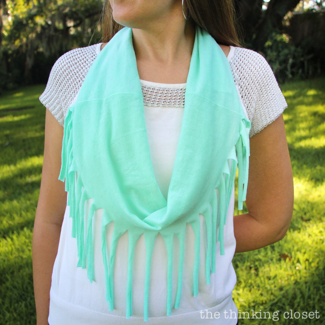 10 Minute Fringe Infinity T-Shirt Scarf - - one of the quickest, easiest, and most fun DIY projects you'll ever do!  Oh, and the best part?  Supplies are FREE if you raid your closet for an old t-shirt to upcycle!  Just another inspiring tutorial from Scarf Week 2015!  Stop by to check out all 7 DIY T-Shirt Scarves.