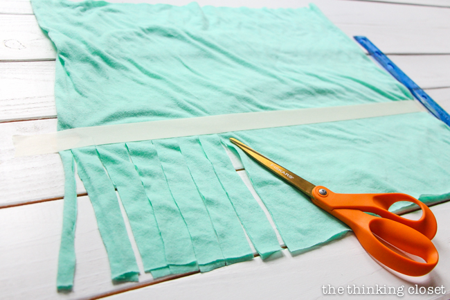 Step 3 of an easy, inexpensive, and FUN DIY scarf project: a 10 Minute Fringe Infinity T-Shirt Scarf.  Just one of many inspirational tutorials during Scarf Week! 
