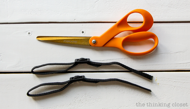 Prepping the nylon webbing connectors! Just another step in the DIY Scarf Camera Strap Tutorial: Upcycle a scarf into a snazzy camera strap that will quickly become your new favorite accessory. This sewing tutorial will walk you through each step of the fun refashion. Happy Scarf Week 2015! Prepping the nylon webbing connectors! Just another step in the DIY Scarf Camera Strap Tutorial: Upcycle a scarf into a snazzy camera strap that will quickly become your new favorite accessory. This sewing tutorial will walk you through each step of the fun refashion. Happy Scarf Week 2015!