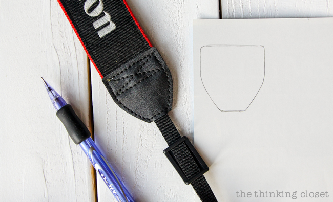 Creating a traced template for the leather pieces. Just another step in the DIY Scarf Camera Strap Tutorial: Upcycle a scarf into a snazzy camera strap that will quickly become your new favorite accessory. This sewing tutorial will walk you through each step of the fun refashion. Happy Scarf Week 2015! Creating a traced template for the leather pieces. Just another step in the DIY Scarf Camera Strap Tutorial: Upcycle a scarf into a snazzy camera strap that will quickly become your new favorite accessory. This sewing tutorial will walk you through each step of the fun refashion. Happy Scarf Week 2015!