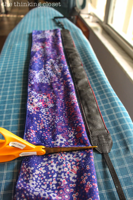 Cutting the scarf! Just another step in the DIY Scarf Camera Strap Tutorial: Upcycle a scarf into a snazzy camera strap that will quickly become your new favorite accessory. This sewing tutorial will walk you through each step of the fun refashion. Happy Scarf Week 2015! Cutting the scarf! Just another step in the DIY Scarf Camera Strap Tutorial: Upcycle a scarf into a snazzy camera strap that will quickly become your new favorite accessory. This sewing tutorial will walk you through each step of the fun refashion. Happy Scarf Week 2015!