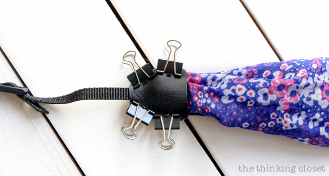 Prepping "The Bermuda Triangle." Just another step in the DIY Scarf Camera Strap Tutorial: Upcycle a scarf into a snazzy camera strap that will quickly become your new favorite accessory. This sewing tutorial will walk you through each step of the fun refashion. Happy Scarf Week 2015! Prepping "The Bermuda Triangle." Just another step in the DIY Scarf Camera Strap Tutorial: Upcycle a scarf into a snazzy camera strap that will quickly become your new favorite accessory. This sewing tutorial will walk you through each step of the fun refashion. Happy Scarf Week 2015!