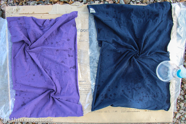 Spraying, splattering, and spritzing bleach onto the scarves to create galaxies and stars, step 5 in the process of creating your DIY Galaxy Print Infinity Scarf--just another fun t-shirt upcycle during Scarf Week 2015!