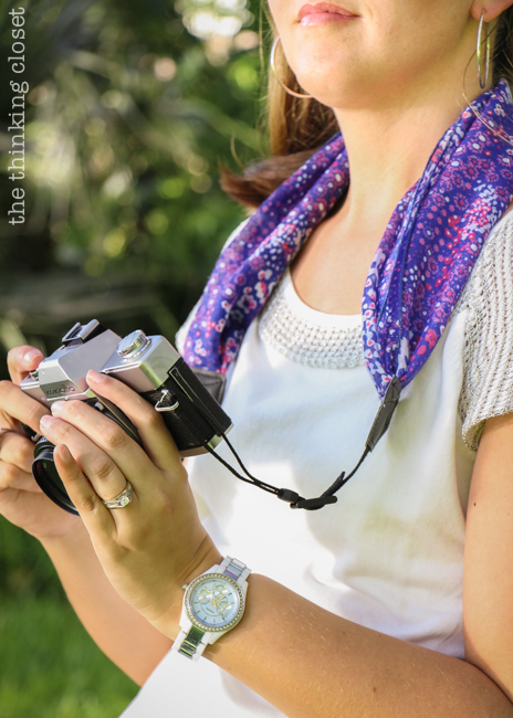 DIY Scarf Camera Strap Tutorial: Upcycle a scarf into a snazzy camera strap that will quickly become your new favorite accessory. This sewing tutorial will walk you through each step of the fun refashion. Happy Scarf Week 2015!