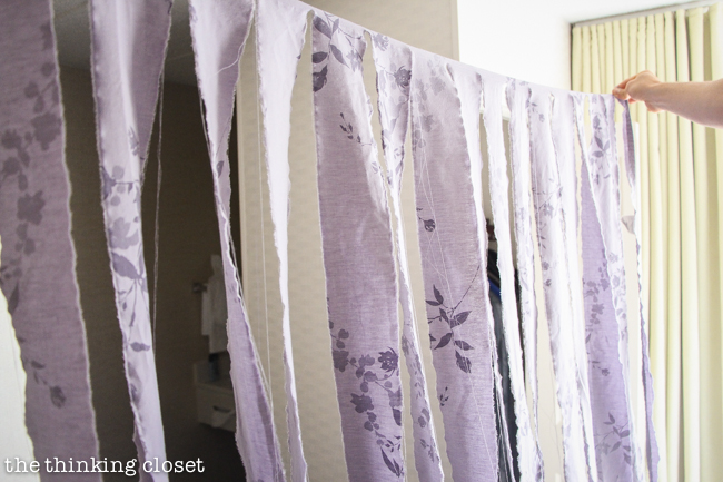 D.I.Y. Shabby Chic Fabric Photo Booth Backdrop | Ripping the fabric into strips--this is the fun part! D.I.Y. Shabby Chic Fabric Photo Booth Backdrop | Ripping the fabric into strips--this is the fun part!