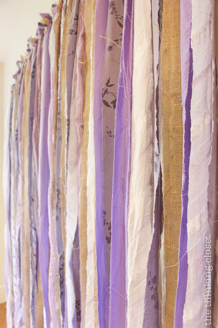 D.I.Y. Shabby Chic Fabric Photo Booth Backdrop | Step by step photo tutorial for creating a backdrop out of strips of fabric, perfect for a rustic vintage wedding or birthday or photo shoot! An easy and inexpensive project that will provide instant entertainment and whimsy to your next festivity!