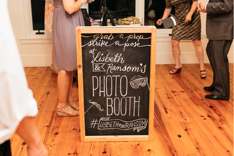 D.I.Y. Shabby Chic Fabric Photo Booth Backdrop with Chalkboard Sign | Step by step photo tutorial for creating a backdrop out of strips of fabric, perfect for a rustic vintage wedding or birthday or photo shoot! An easy and inexpensive project that will provide instant entertainment and whimsy to your next festivity!