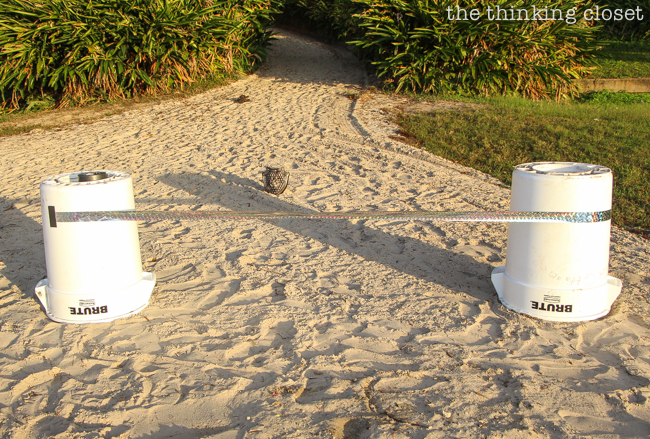 "The Warrior Dash" Toddler Obstacle Course Gift Idea: Video Demo | Obstacle #8: The Finish Line! Supplies: glitter tape or streamer and two bins or chairs. The prize is just beyond!