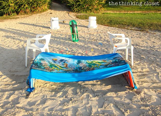 "The Warrior Dash" Toddler Obstacle Course Gift Idea: Video Demo | Obstacle #5: Under the Sea! Supplies: plastic tablecloth and boogie boards or chairs. Darling it's better down where it's wetter! 