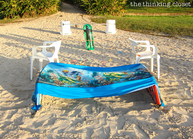 "The Warrior Dash" Toddler Obstacle Course Gift Idea: Video Demo | Obstacle #5: Under the Sea! Supplies: plastic tablecloth and boogie boards or chairs. Darling it's better down where it's wetter!