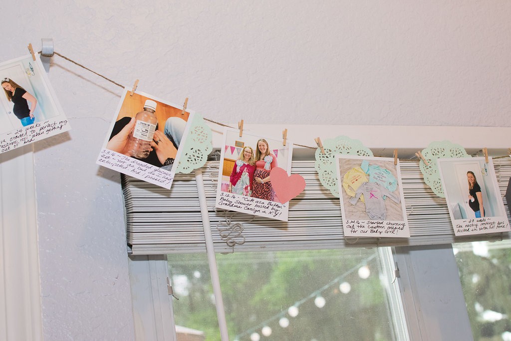 Pregnancy Milestone Timeline Banner: From Party Decor to Baby Scrapbook! | Here's how I saved time and money creating a simple photo banner garland for my baby shower. All of the banner elements can be popped into a scrapbook or baby book! Gotta love double-duty crafting.