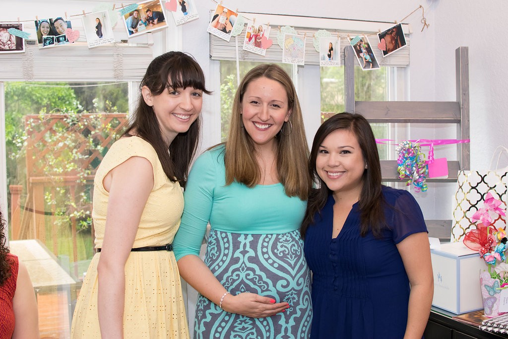 Pregnancy Milestone Timeline Banner: From Party Decor to Baby Scrapbook! | Here's how I saved time and money creating a simple photo banner garland for my baby shower. All of the banner elements can be popped into a scrapbook or baby book! Gotta love double-duty crafting.