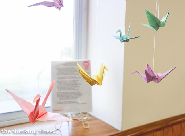"Cute as a Button" Baby Shower | DIY & Handmade Baby Shower Ideas to Inspire a Party to Remember! Here was the paper crane mobile created by shower guests for the baby nursery!
