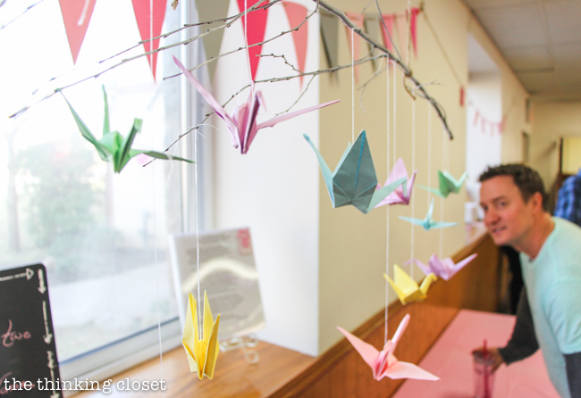 "Cute as a Button" Baby Shower | DIY & Handmade Baby Shower Ideas to Inspire a Party to Remember! Here was the paper crane mobile created by shower guests for the baby nursery!