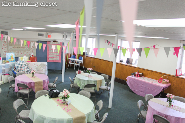 "Cute as a Button" Baby Shower | DIY & Handmade Baby Shower Ideas to Inspire a Party to Remember! Pennant banners strung across the room really added a touch of whimsy to the church fellowship hall.