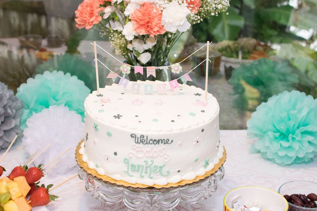 "Bring a Book" Baby Shower | A creative way to help build Baby's library is to invite guests to bring a book instead of card! Here's a peek some of the beautiful, feminine decor that added to the afternoon tea vibe!