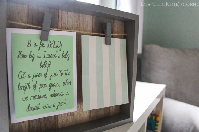 Charming Mint & Gray Baby Shower | Inspiration for planning a meaningful baby shower for a mom-to-be with creative ideas for decor, food, games, activities, a guest book, favors, and more! Here's a glimpse at the instructions for guessing the "girth" of the mama's belly!