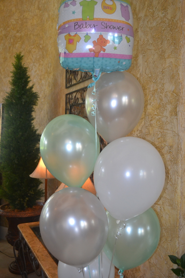 Charming Mint & Gray Baby Shower | Inspiration for planning a meaningful baby shower for a mom-to-be with creative ideas for decor, food, games, activities, a guest book, favors, and more! Here's a glimpse at the decor that perfectly matched the mint and gray color palette!