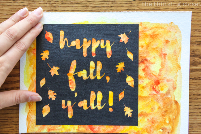 "Happy Fall, Y'all!" Watercolor Art: A Silhouette Cameo 3 Tutorial - After peeling up my adhesive backed cardstock, I applied it to my watercolor background for a vibrant, autumnal finished piece!