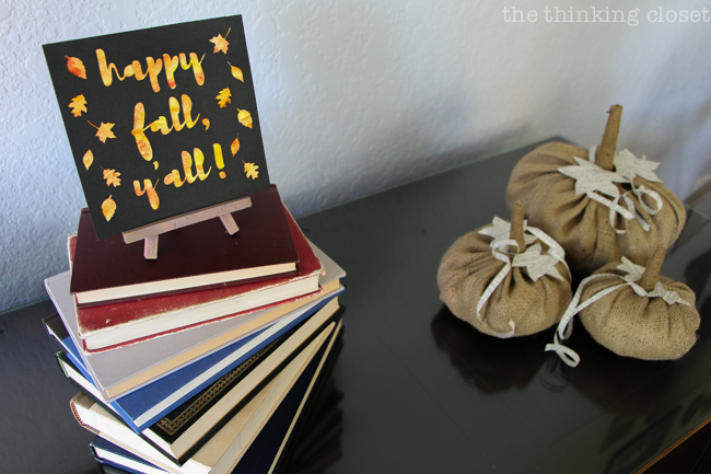 "Happy Fall, Y'all!" Watercolor Art: A Silhouette Cameo 3 Tutorial - After peeling up my adhesive backed cardstock, I applied it to my watercolor background for a vibrant, autumnal finished piece! Here are the black and white renditions for two unique, different looks.