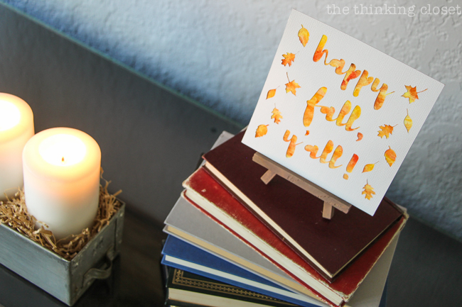 "Happy Fall, Y'all!" Watercolor Art: A Silhouette Cameo 3 Tutorial - After peeling up my adhesive backed cardstock, I applied it to my watercolor background for a vibrant, autumnal finished piece! Here are the black and white renditions for two unique, different looks.